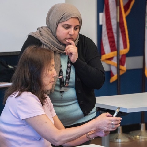 Staff helping patron