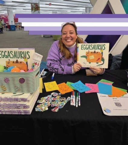 Author holding her book
